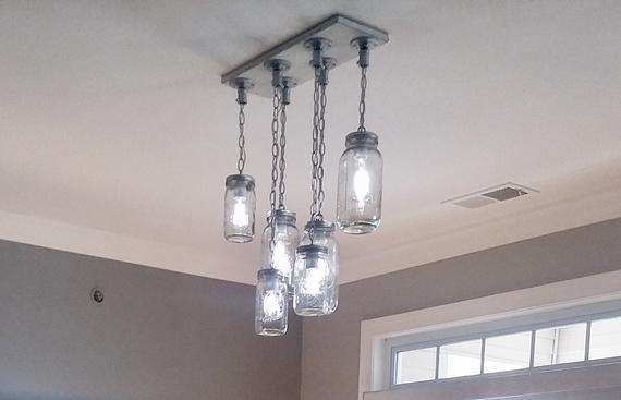 Hanging mason jar chandelier lights in mason jars