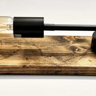 Stylish lamp on wooden base