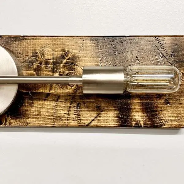 Modern edison light fixture on wooden base stainless steel