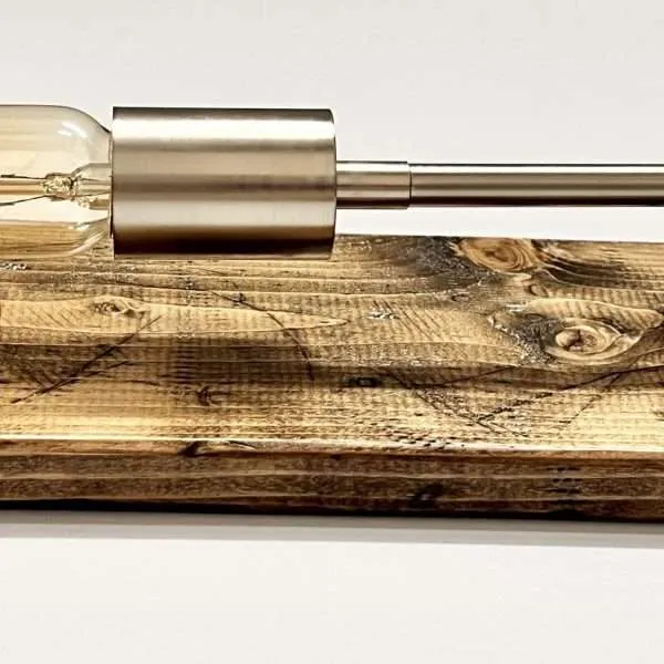 Stylish lamp on wooden base