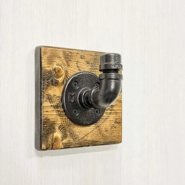 black metal hook on rustic wood solid board farmhouse bathroom decor