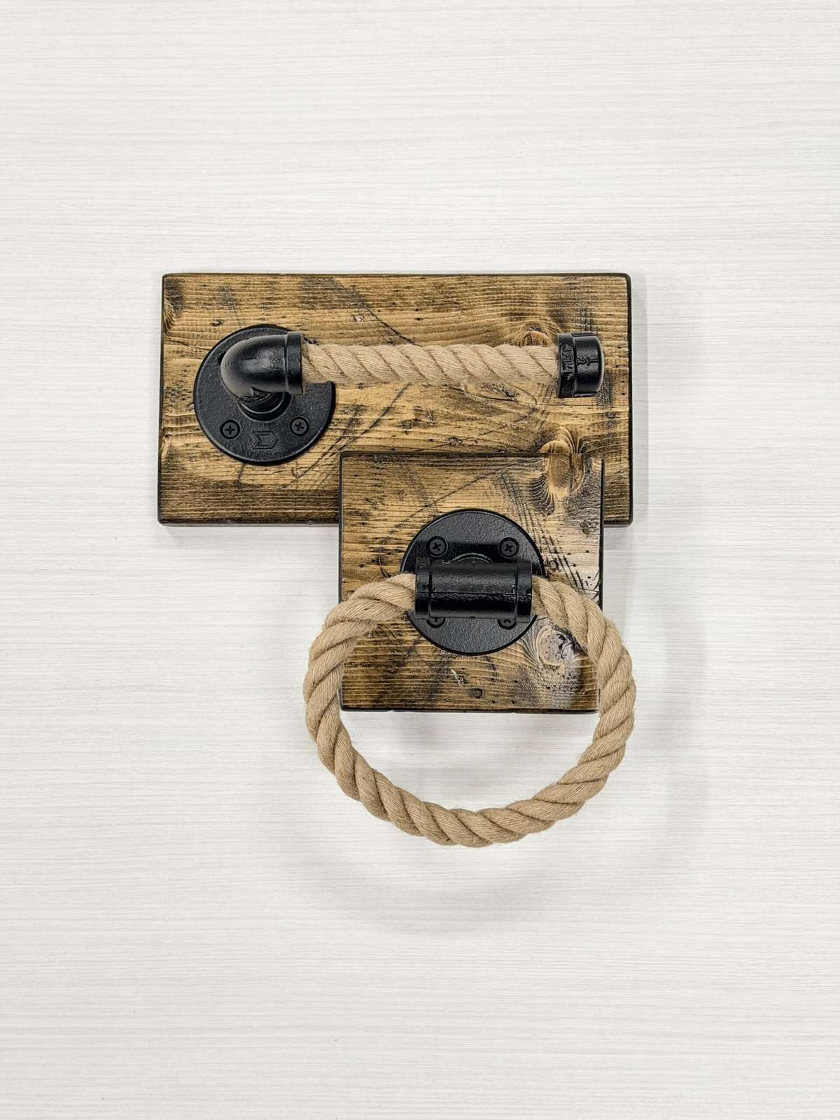 Rustic wooden door handle with rope