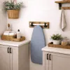ironing board holder on a wall