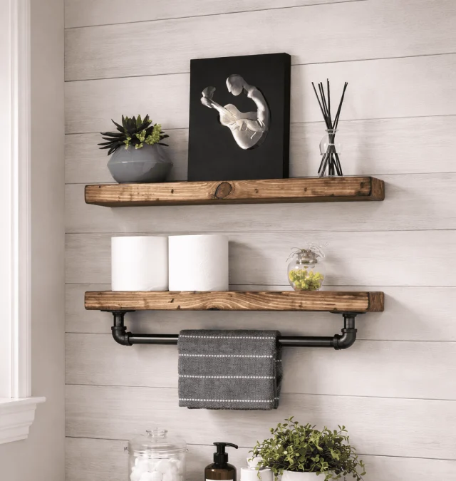 Rustic wood shelves with industrial pipe towel bar