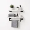 white bathroom shelves on wall