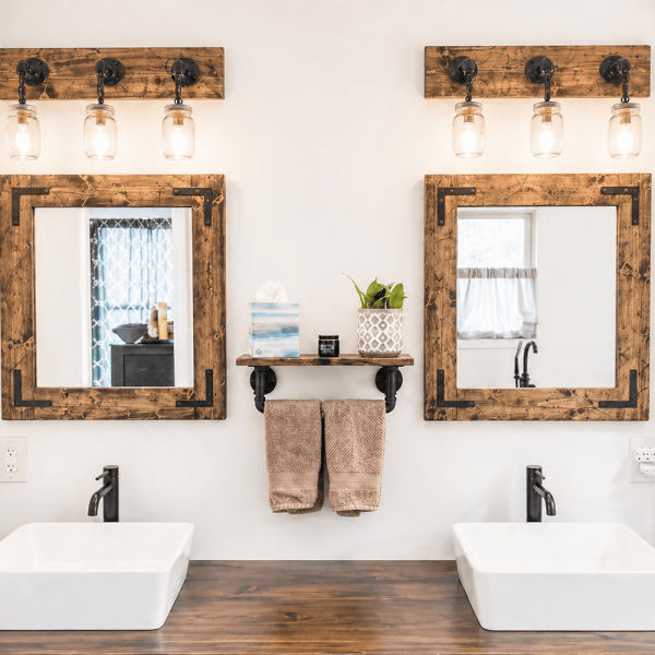 Rustic distressed wood bathroom mirror with oil rubbed bronze corner brackets