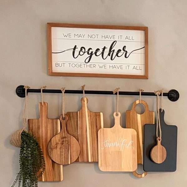 black wall kitchen rack for hanging wood boards or towel in a bathroom