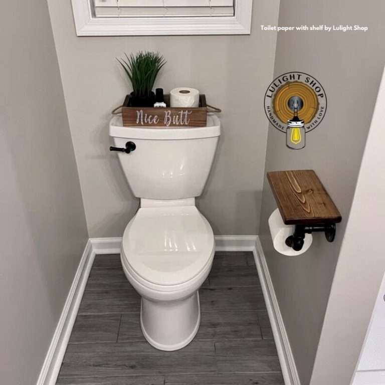 industrial bathroom decor pipe toilet paper holder close up