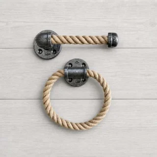 Coastal farmhouse rope bathroom set with towel ring and toilet paper holder on light gray wood background made of pipe and natural rope for bathroom