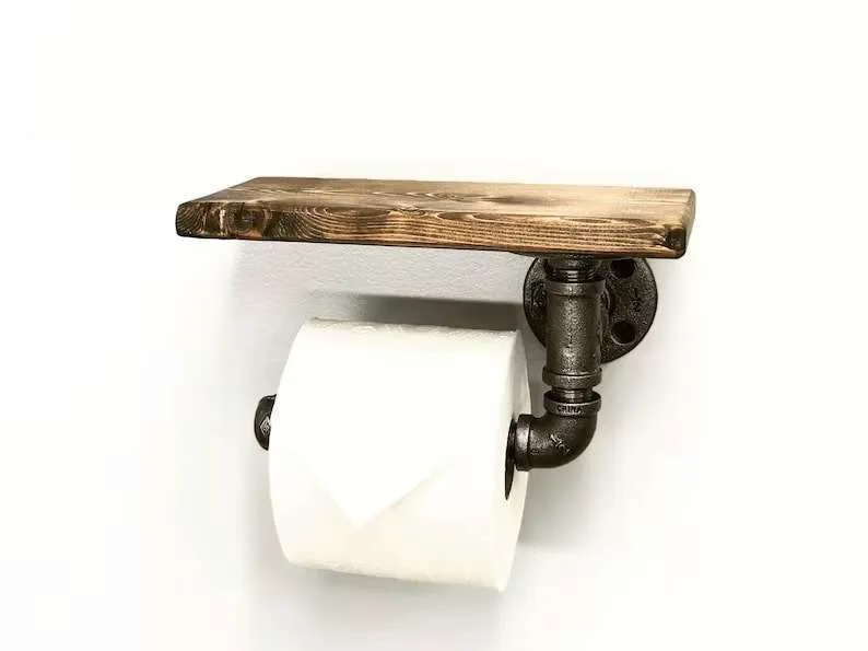 Rustic wood shelf with industrial pipe toilet paper holder