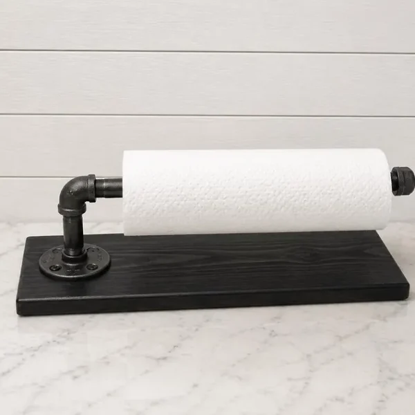 Wall-mounted paper towel holder with a Black wood backplate and Dark Nickel pipe arm